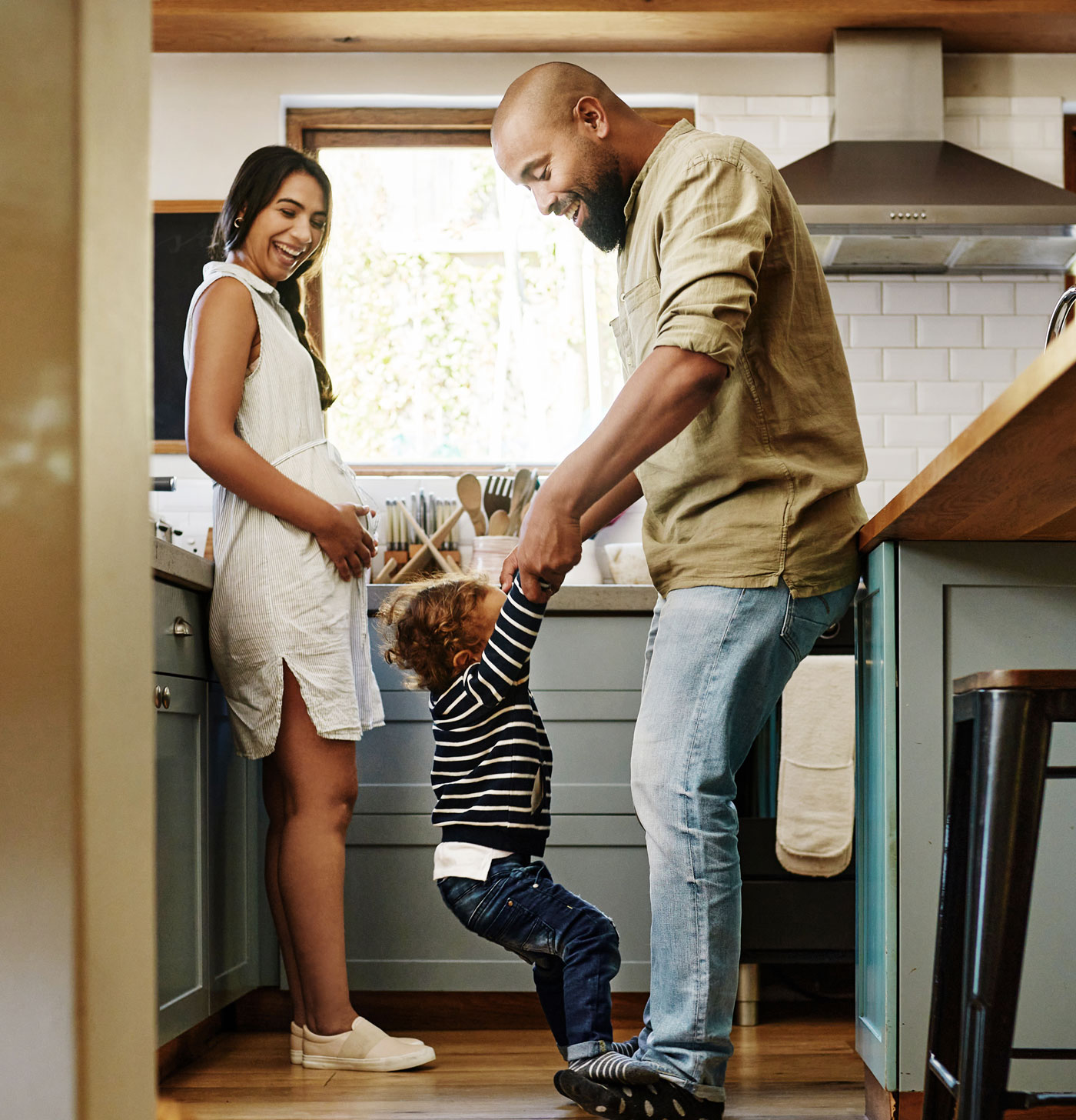 A family enjoys their eat-in kitchen space