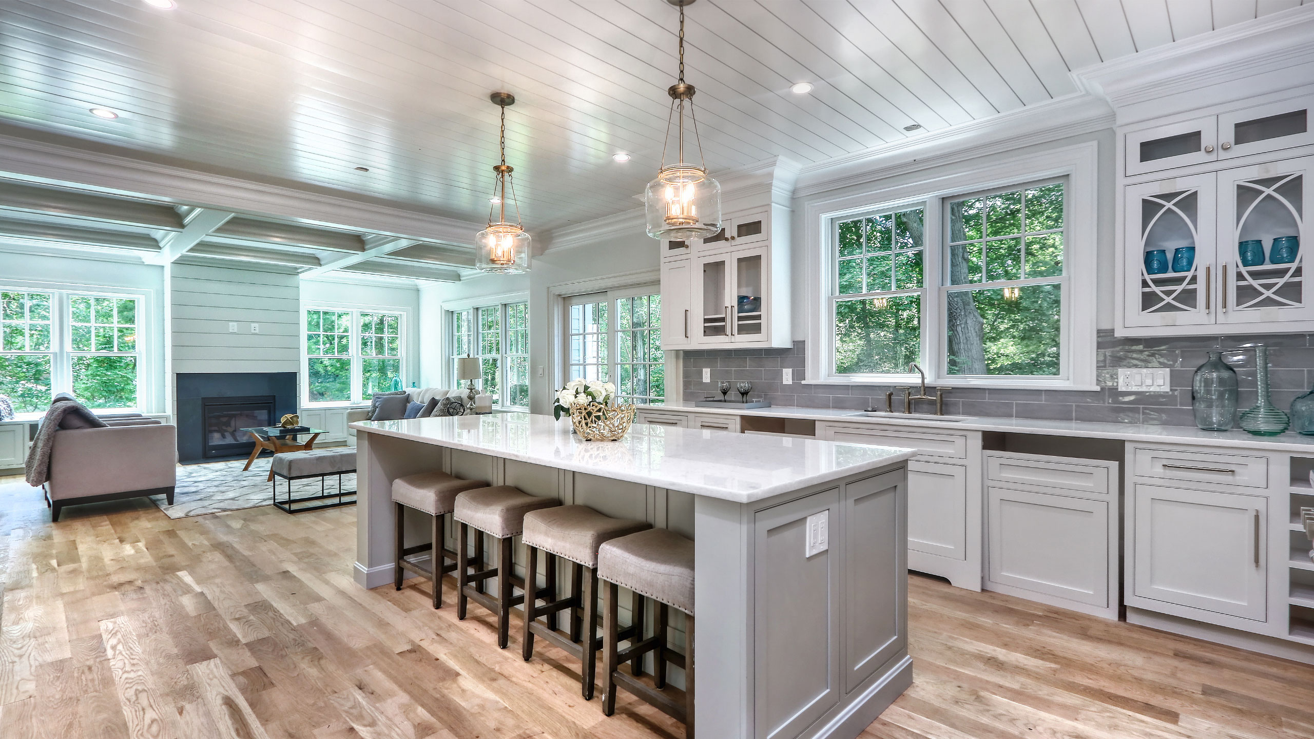 Spacious open concept eat-in kitchen looking into living room