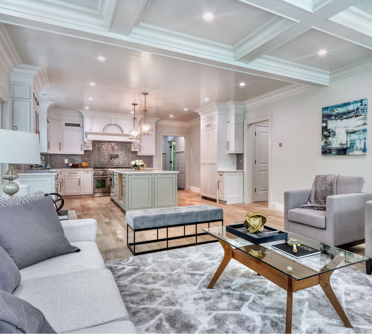 Open concept main living area looking into kitchen
